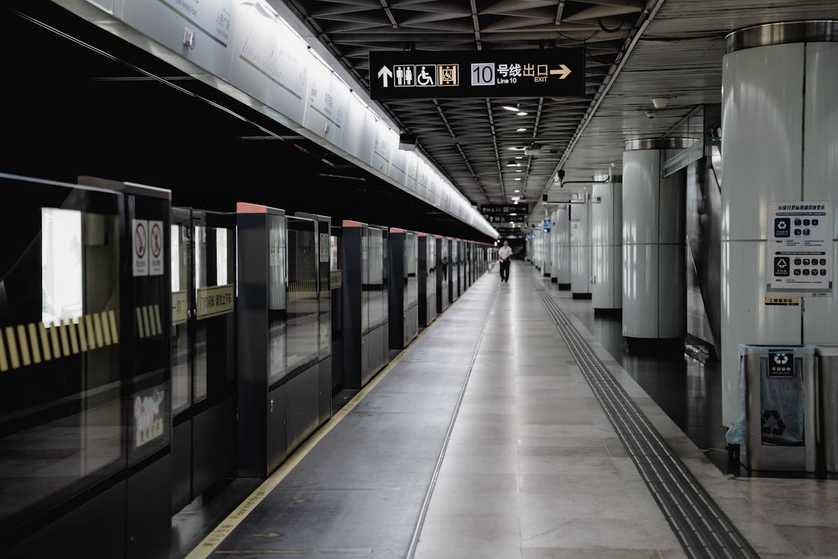 A Shanghai Metro train at a platform with passengers boarding