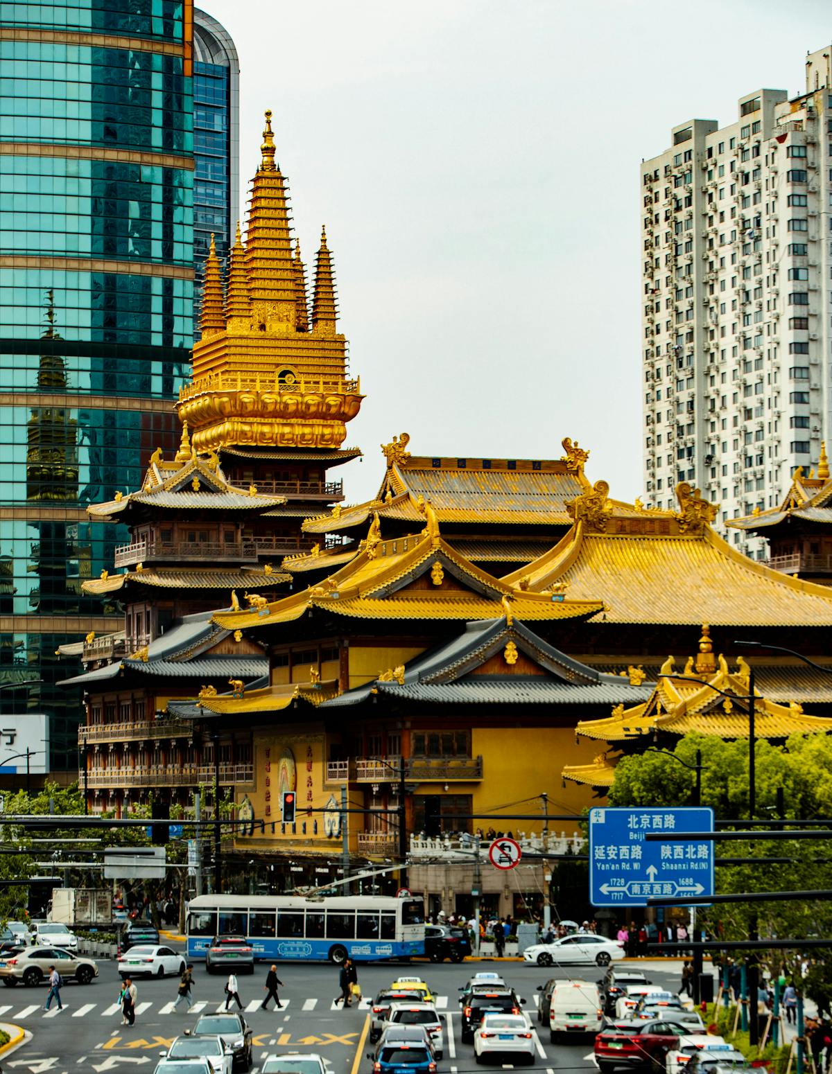 The gilded roofs of Jing'an Temple set against modern skyscrapers in central Shanghai